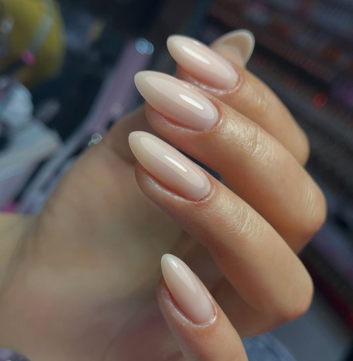 Glossy milky nude almond nails